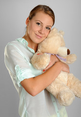 Woman with a teddy bear © gilotyna