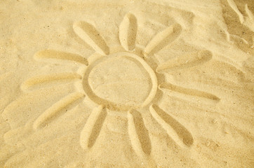 sun drawn in the sand