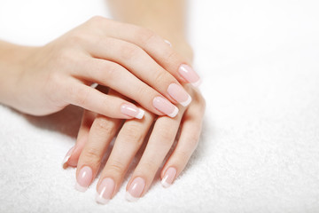 beautiful hands on the white towel