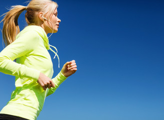 woman doing running outdoors