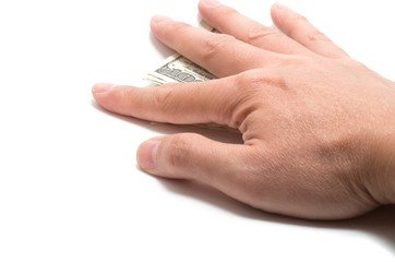 Hand hiding the stash of American banknotes