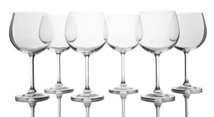 Empty wine glasses arranged and isolated on white