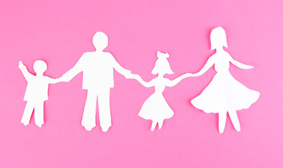 Paper people on color background