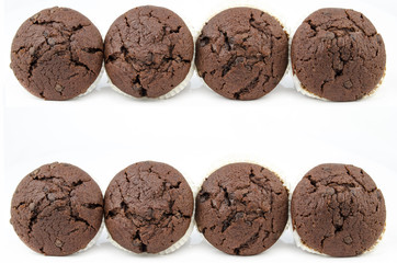 Chocolate muffins isolated on white