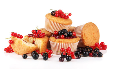 Tasty muffins with berries isolated on white
