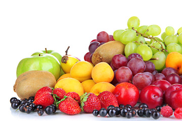 Obraz na płótnie Canvas Fresh fruits and berries isolated on white