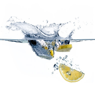 Healthy Water with Lemon. Splashing