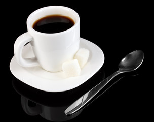 A cup of strong coffee isolated on black