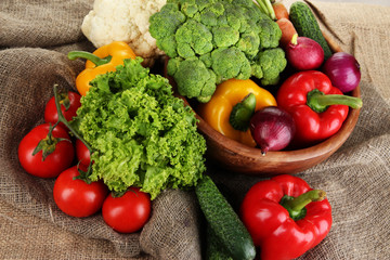 Fresh vegetables on burlap background
