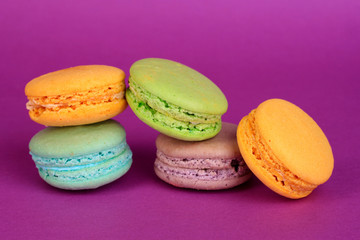 Macaroons on purple background