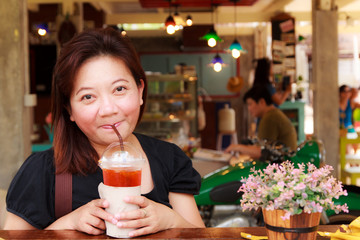 Happy woman drink tea