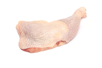 raw chicken leg on white background