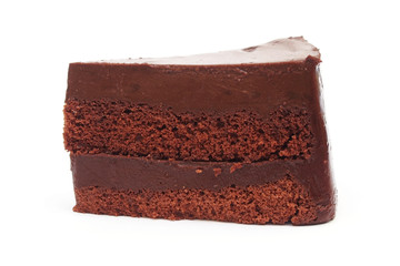 sliced chocolate cake on white background