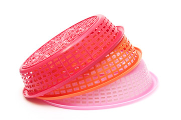 Stack of plastic basket on white background