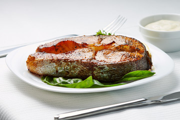 Served Table with Grilled Salmon Steak.