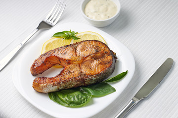 Served Table with Grilled Salmon Steak.