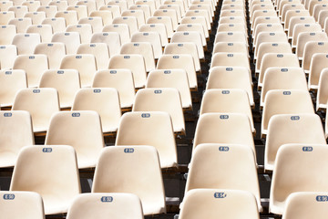 Empty seats under the open sky