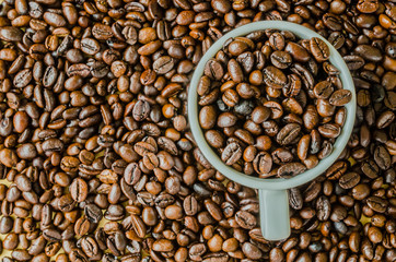 Coffee beans on cup