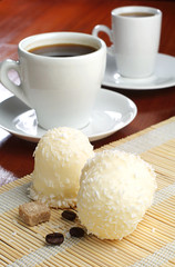 Marshmallows with coconuts and cup of coffee