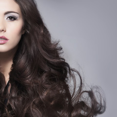 Beauty portrait of a young and attractive brunette woman