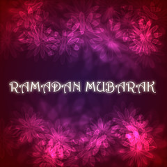 Text Ramadan Mubarak on colorful background with flover effect