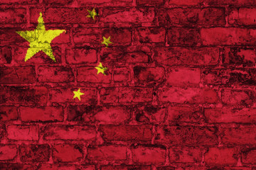 Chinese flag graphic on brick wall background