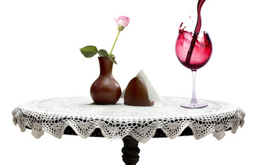 wine glasses with flower on a table