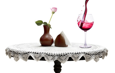wine glasses with flower on a table