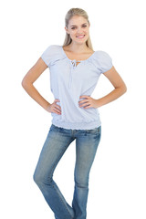 Fototapeta premium Blonde woman with hands on her hips