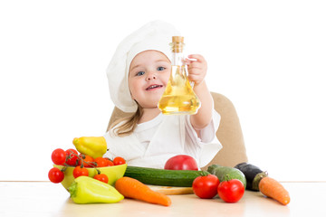 cute girl with healthy food vegetables and sunflower oil