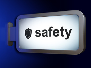 Privacy concept: Safety and Shield on billboard background