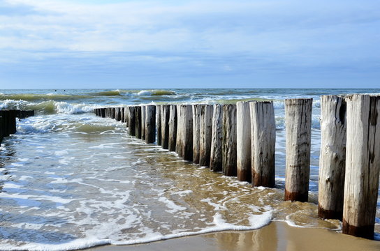 breakwaters on the beach at the north sea in Domburg Holland
