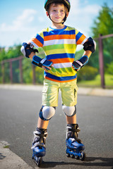 Cute little boy with rollers
