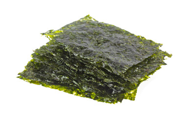 Seaweed wafers on white background © Bert Folsom