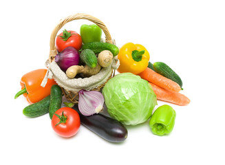 vegetables in a basket on a white background. horizontal photo.