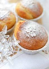 Close-up of Christmas muffins decorated with powdered sugar