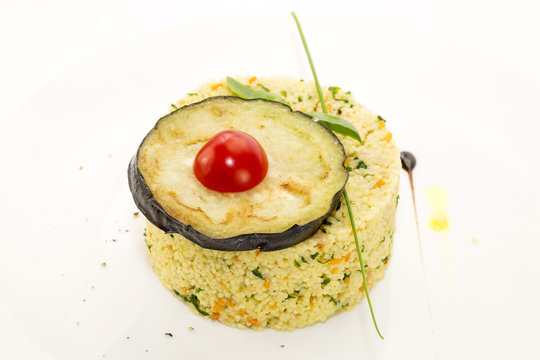 couscous embellished with eggplant and tomato