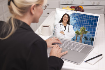 Fototapeta na wymiar Woman Using Laptop - Online with Nurse or Doctor