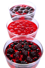 Jelly with fresh berries close up