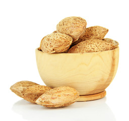 Almond in wooden bowl, isolated on white