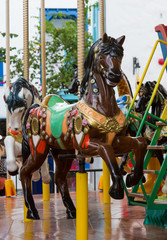 Fototapeta na wymiar The Horse in merry go round at carnival