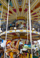 Merry go round in carnival vertical