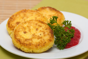 Sweet cheese pancakes on a plate