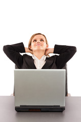 Business woman taking a break and relaxing with her hands behind