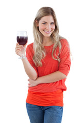 Smiling woman looking at the camera with red wine glass