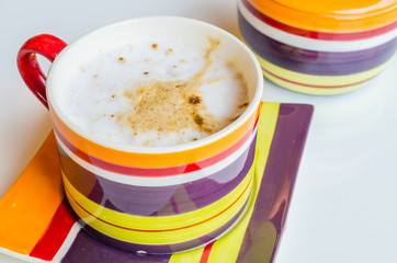 Cappuccino in colorful cup
