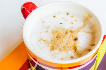 Cappuccino in colorful cup