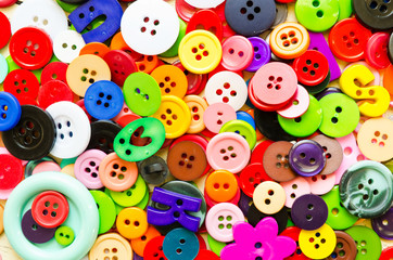 Fototapeta na wymiar Colorful plastic sewing buttons