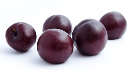 Plums fruit isolated on a white