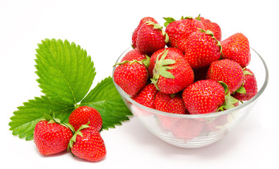 Red strawberry in the bowl isolated